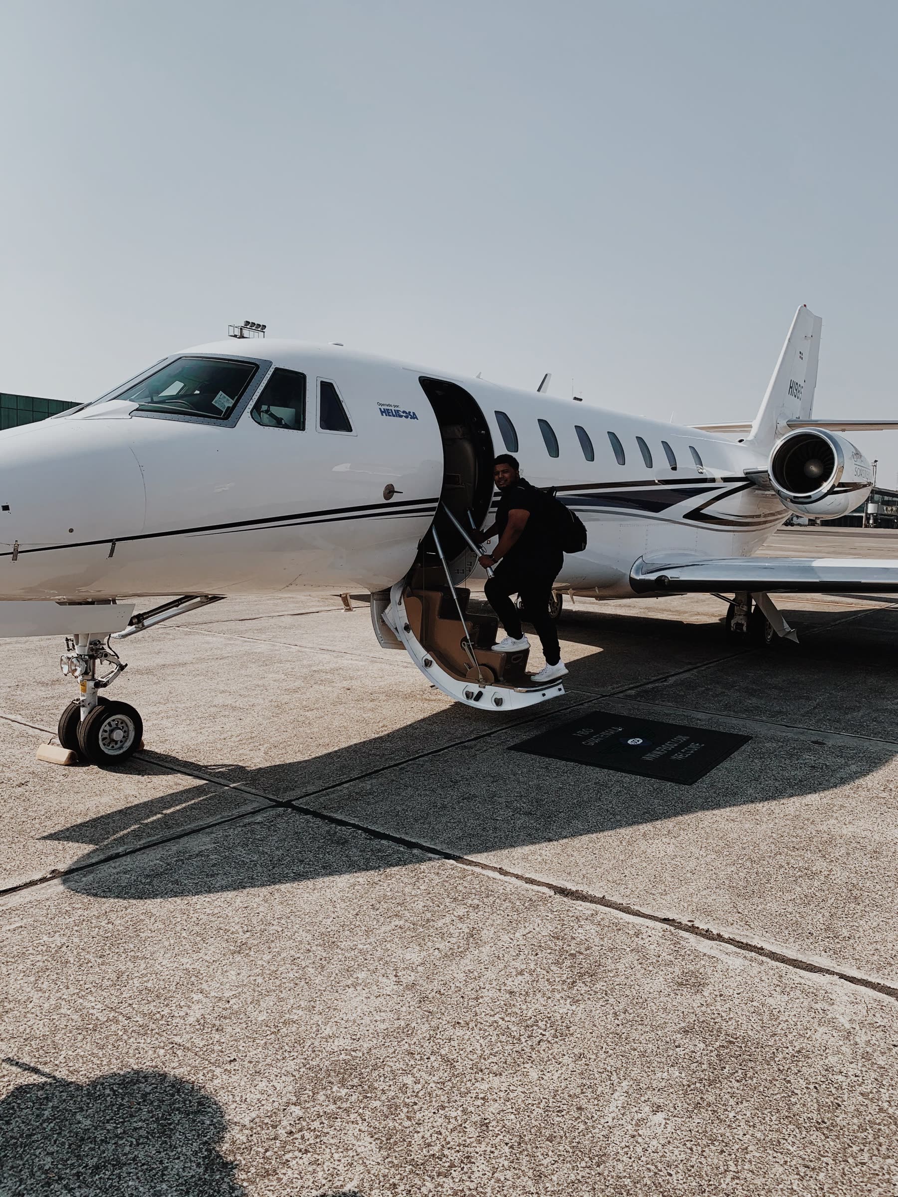 Boarding a private jet on the ramp