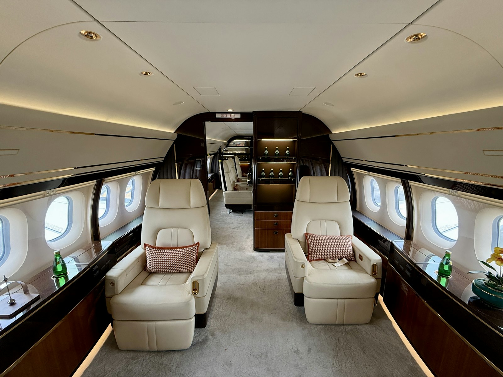 Bespoke jet interior with gold armrests
